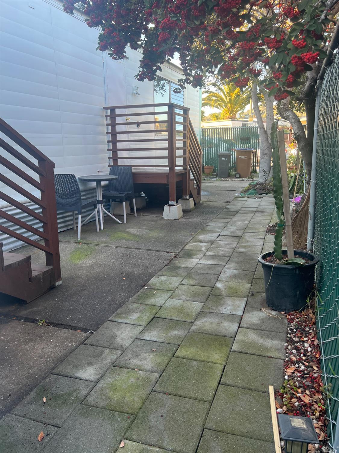 2130 Redwood Highway, Unit F5 Greenbrae, CA 94904 - Photo 15 of 20 a backyard of a house with seating space