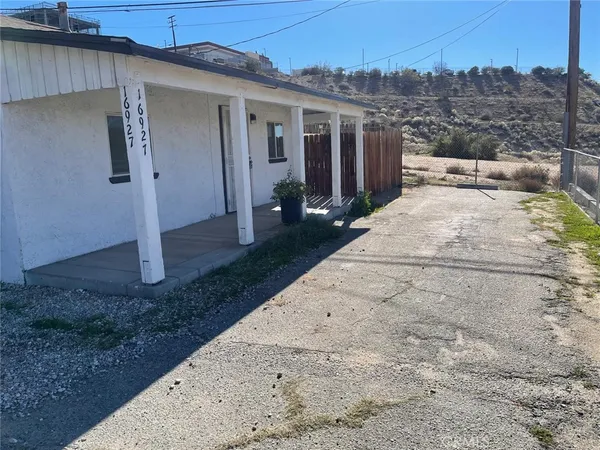 a spacious bathroom with a sink and a yard