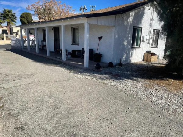 a view of a house with a patio