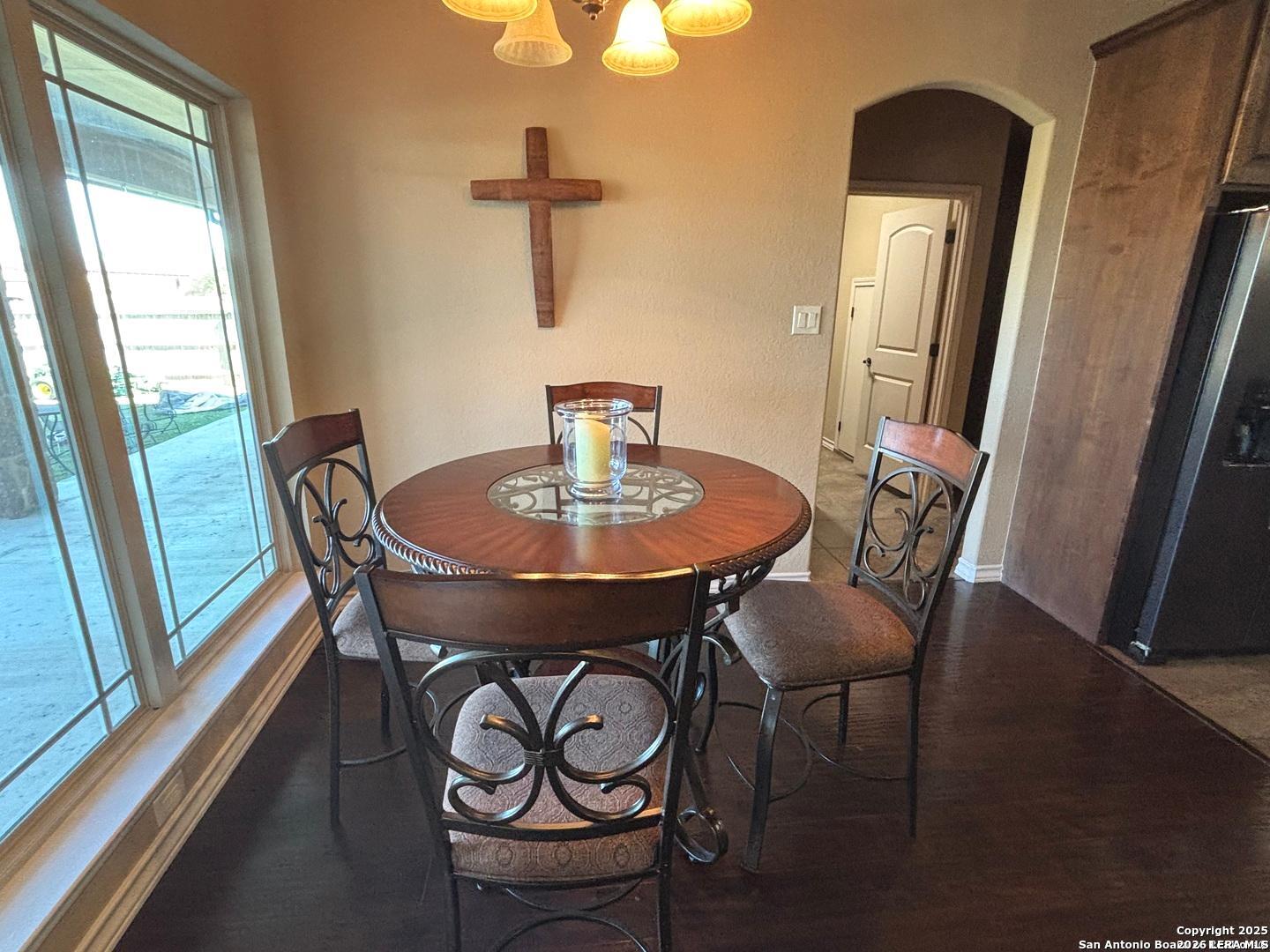 104 Park View Poth, TX 78147 - Photo 16 of 54 a view of a dining room with furniture and wooden floor