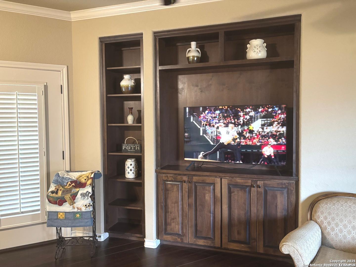 104 Park View Poth, TX 78147 - Photo 19 of 54 a living room with furniture and a flat screen tv