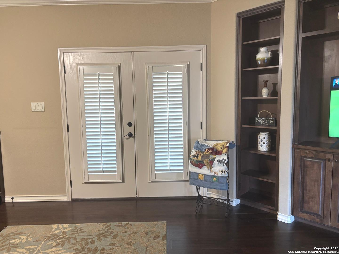 104 Park View Poth, TX 78147 - Photo 20 of 54 a hallway with front door wooden floor and front door