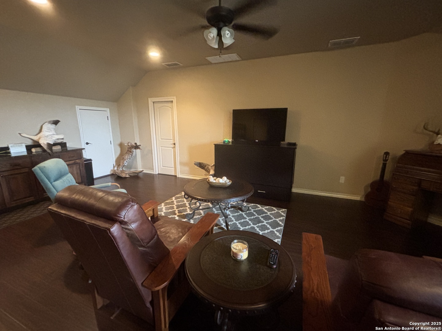 104 Park View Poth, TX 78147 - Photo 43 of 54 a living room with furniture and a flat screen tv