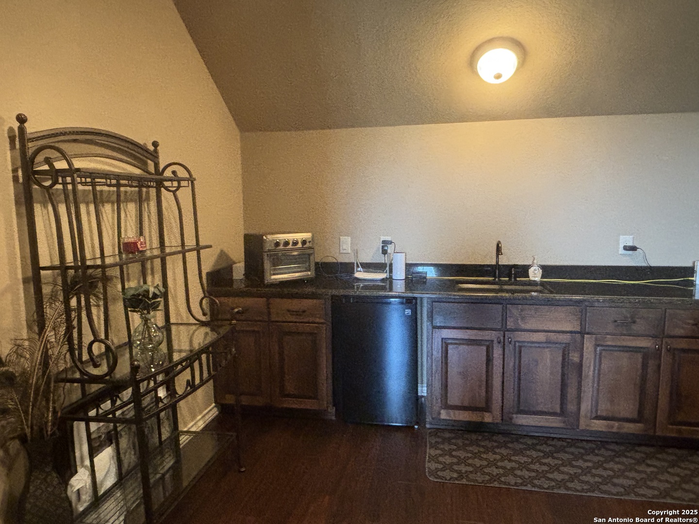 104 Park View Poth, TX 78147 - Photo 45 of 54 a kitchen with a sink and cabinets