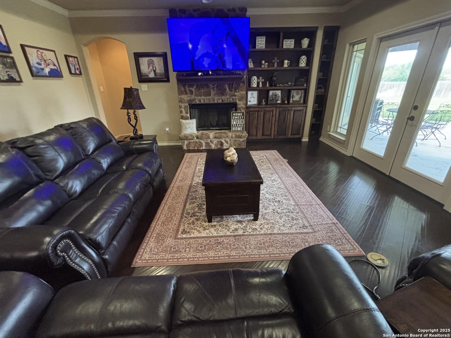 104 Park View Poth, TX 78147 - Photo 8 of 54 a living room with furniture and a fireplace