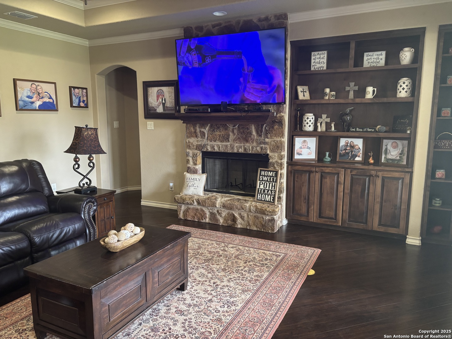 104 Park View Poth, TX 78147 - Photo 9 of 54 a living room with furniture and a fireplace