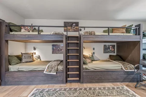 a bedroom with a bed and closet