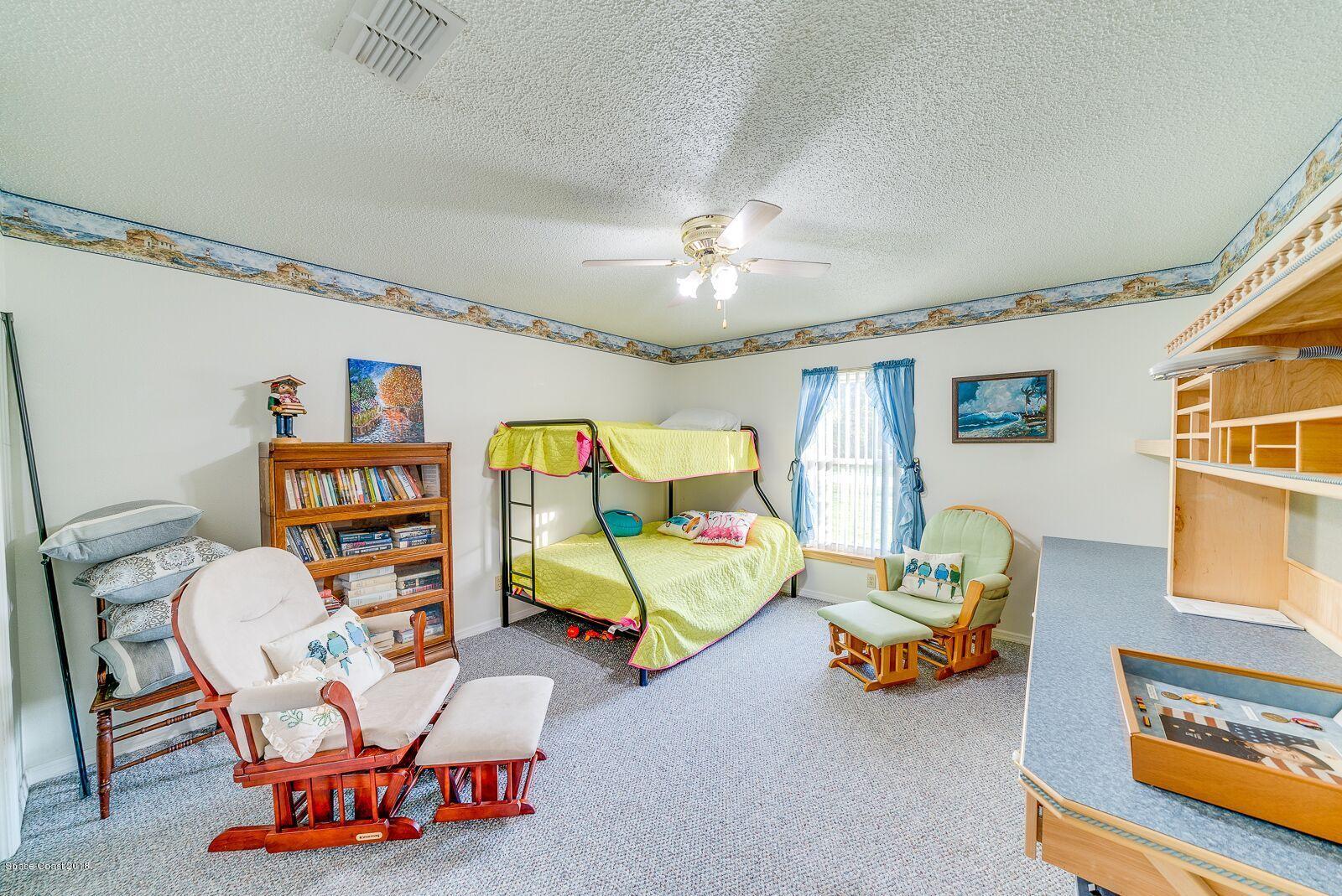 939 Raleigh Road Southeast Palm Bay, FL 32909 - Photo 15 of 30 LLV BEDROOM 2 P11