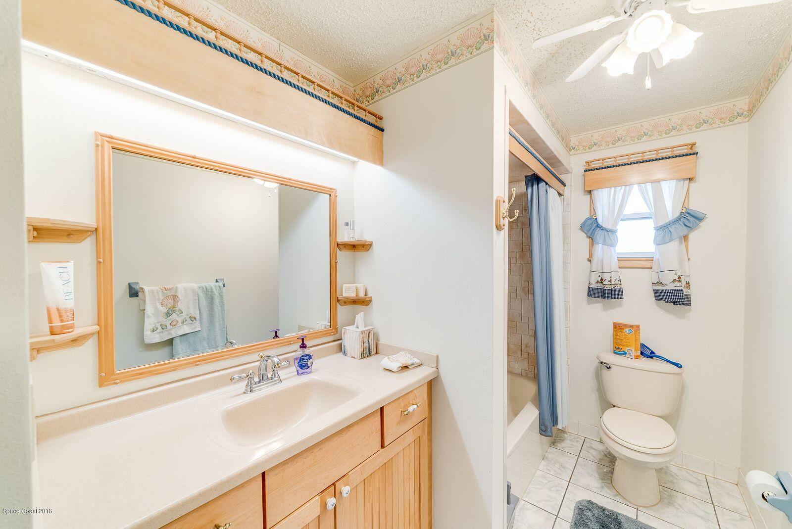 939 Raleigh Road Southeast Palm Bay, FL 32909 - Photo 16 of 30 LLV FAMILY BATH 1