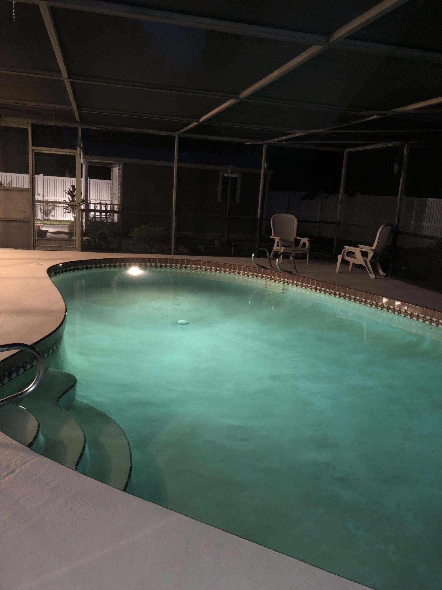 939 Raleigh Road Southeast Palm Bay, FL 32909 - Photo 23 of 30 POOL NIGHT 1