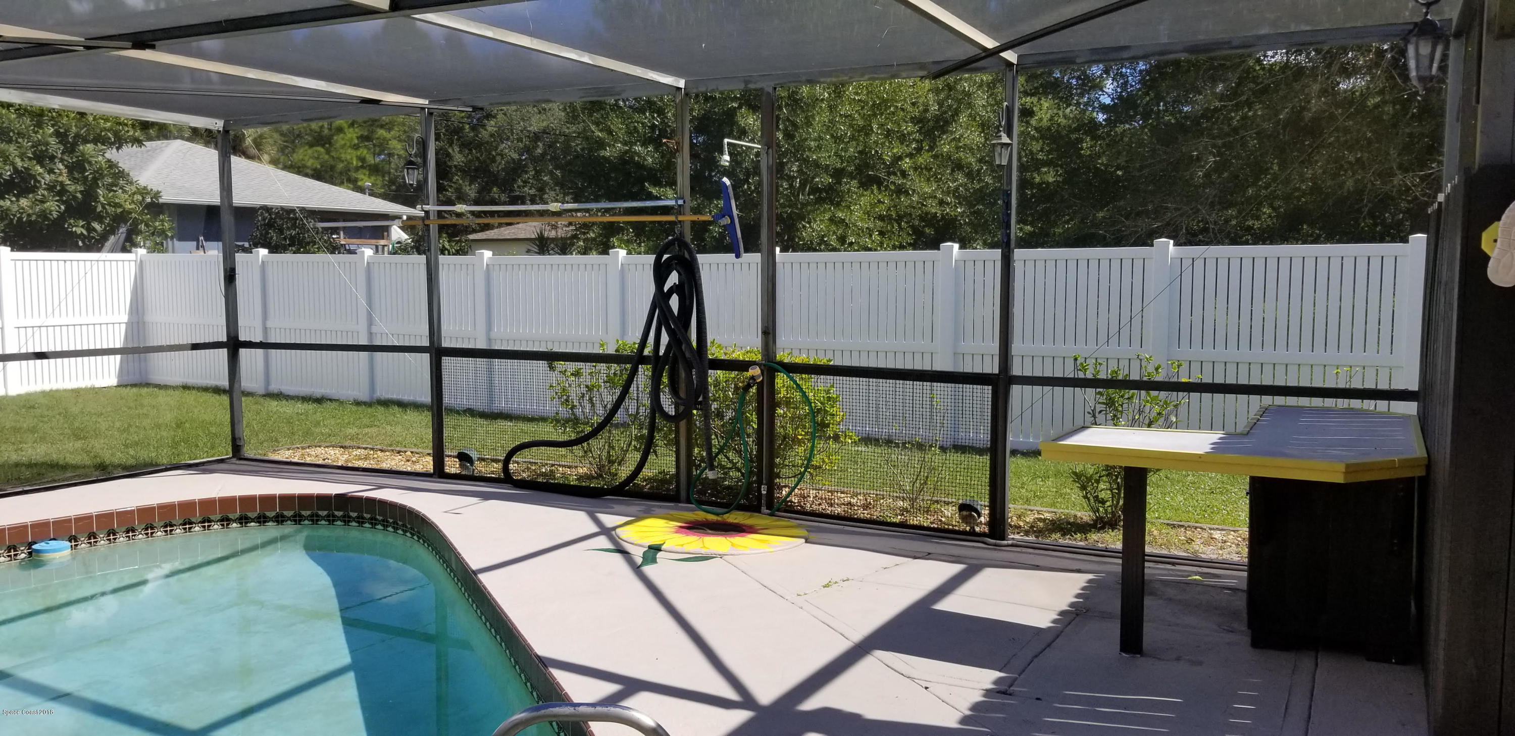 939 Raleigh Road Southeast Palm Bay, FL 32909 - Photo 27 of 30 POOL FENCE