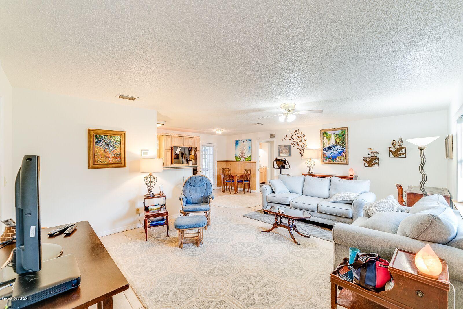 939 Raleigh Road Southeast Palm Bay, FL 32909 - Photo 9 of 30 LLV LIVING ROOM 3