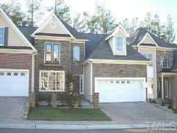 203 Nouveau Avenue Raleigh, NC 27615 - Photo 1 of 1 a front view of a house with garden