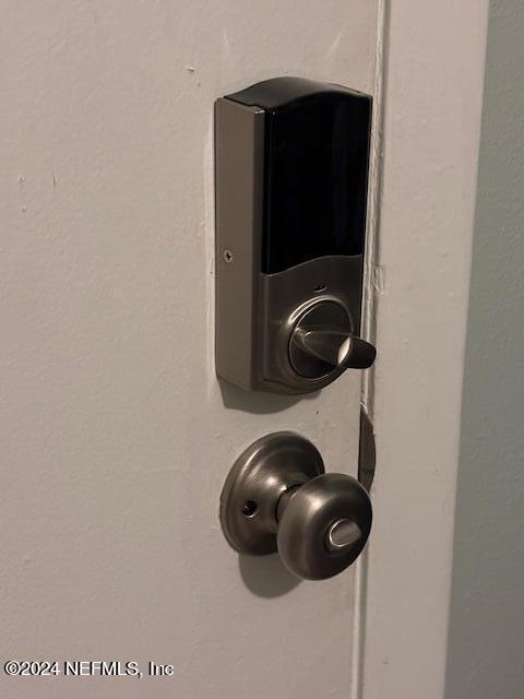 700 West Pope Road, Unit M104 St. Augustine, FL 32080 - Photo 25 of 35 a close view of door lock