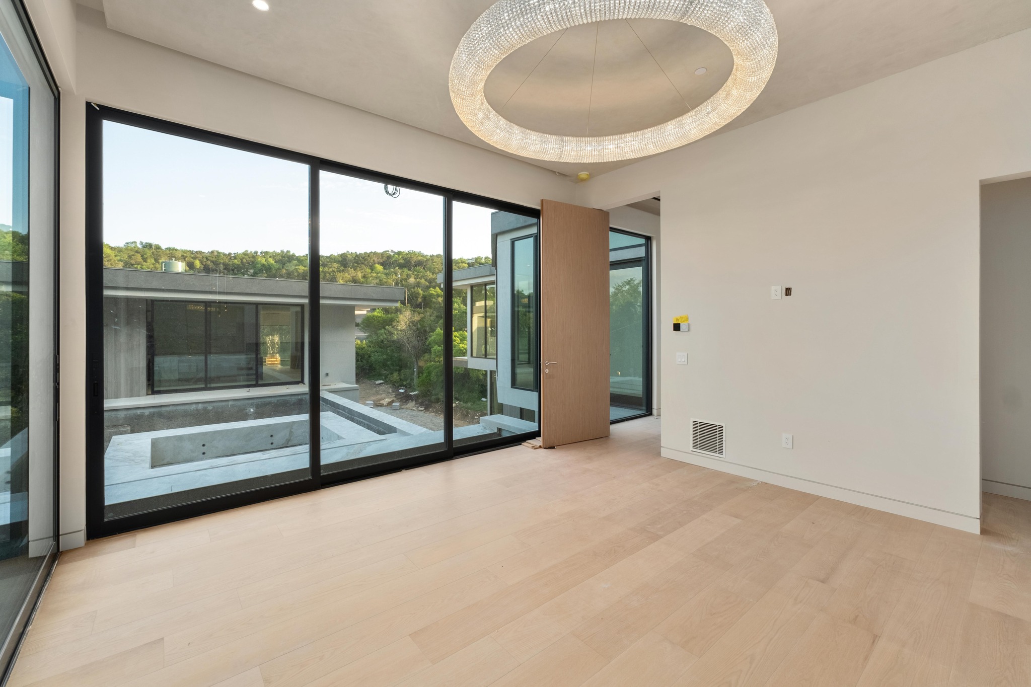 716 Laurel Valley Road West Lake Hills, TX 78746 - Photo 21 of 38 a view of an empty room and glass door