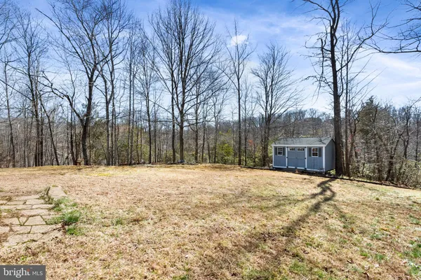 a house with trees in front of it