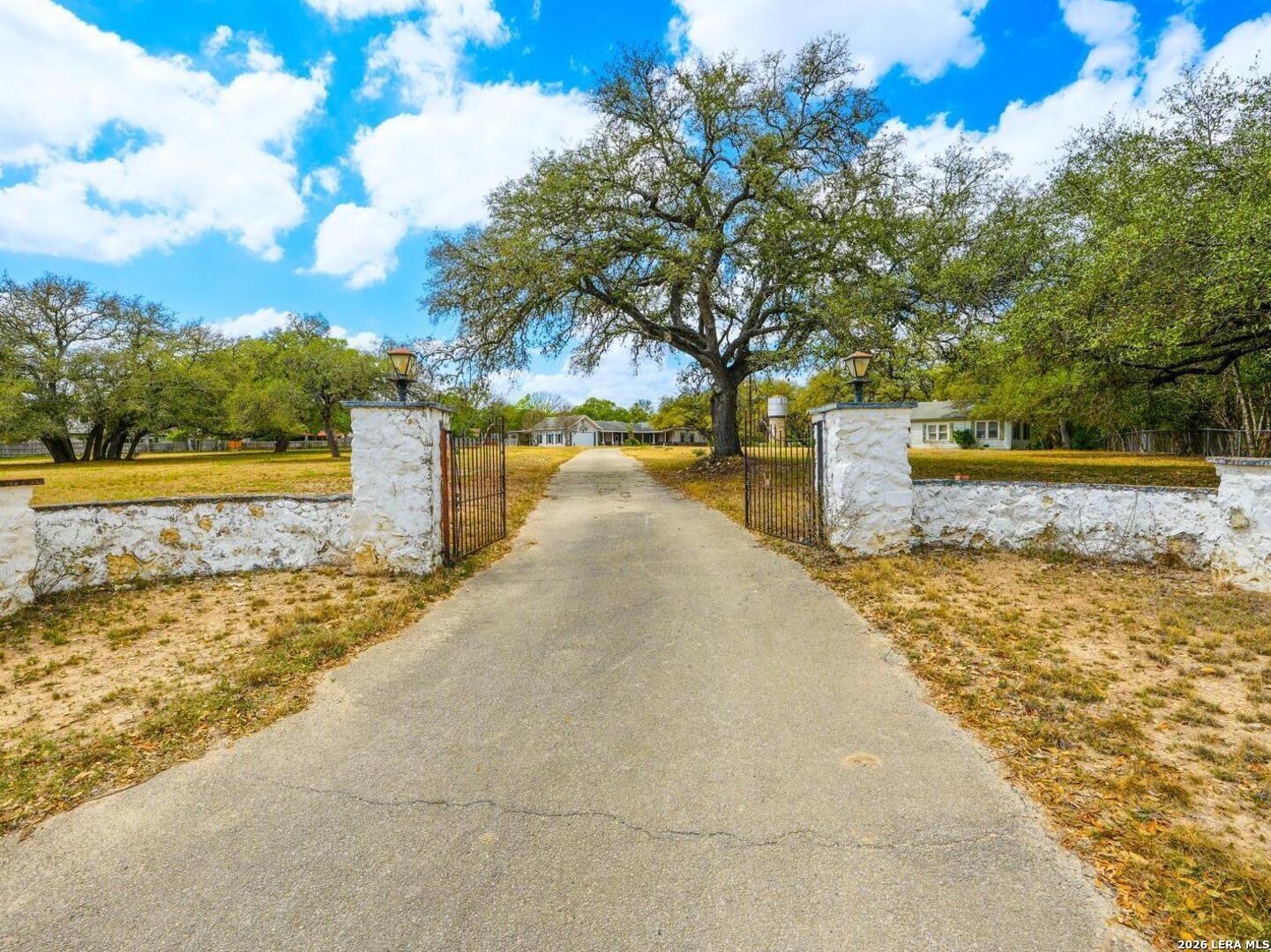 137 Kitty Hawk Road Universal City, TX 78148 - Photo 2 of 25 a view of a yard with an outdoor space