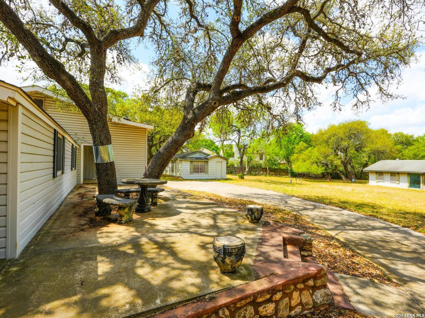 137 Kitty Hawk Road Universal City, TX 78148 - Photo 7 of 25 a view of a yard with swimming pool