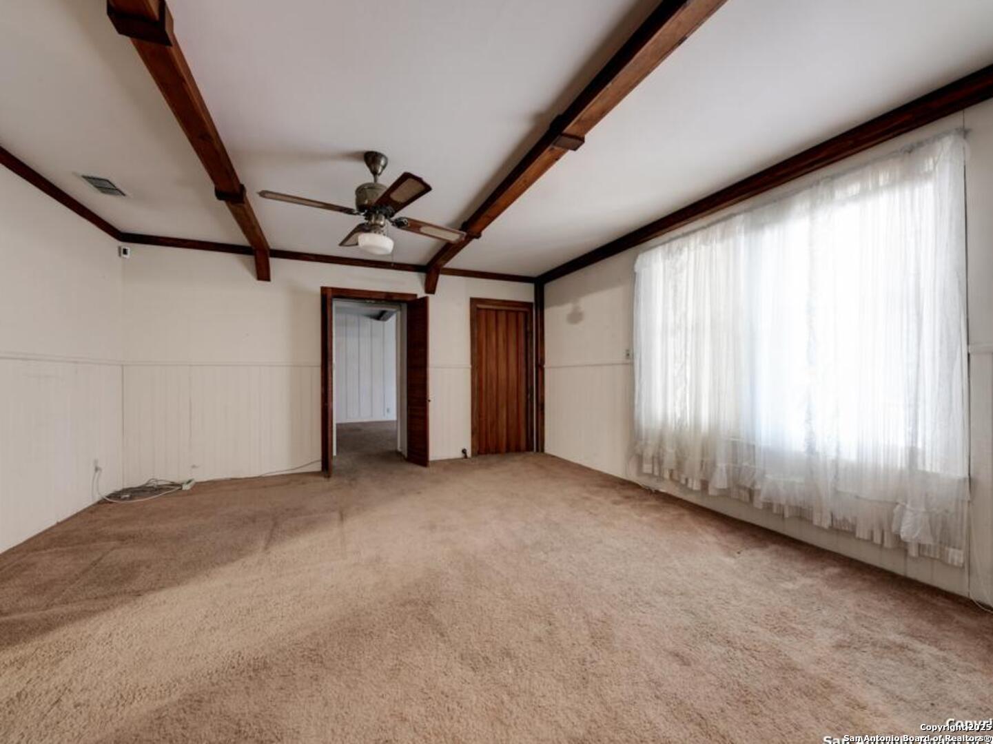 137 Kitty Hawk Road Universal City, TX 78148 - Photo 10 of 25 an empty room with windows