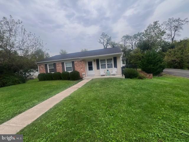 41 John E Mann Street Warrenton, VA 20186 - Photo 2 of 2 a front view of house with yard and green space