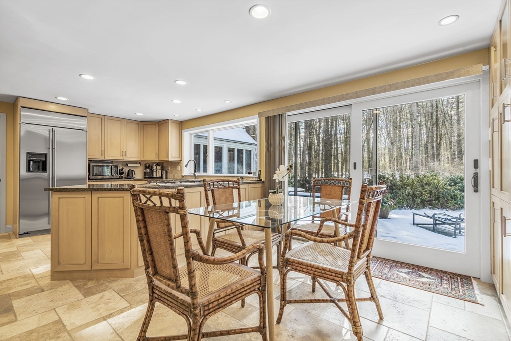 19 Sears Road Wayland, MA 01778 - Photo 15 of 42 a view of a dining room with furniture and floor to ceiling window