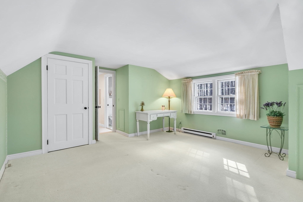 19 Sears Road Wayland, MA 01778 - Photo 31 of 42 a view of a livingroom with furniture and windows