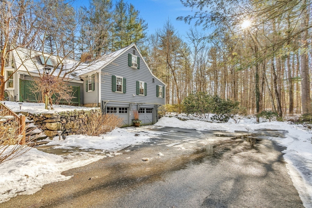 19 Sears Road Wayland, MA 01778 - Photo 35 of 42 a view of a house with a yard covered in snow