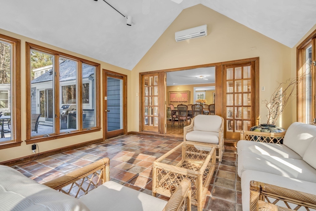 19 Sears Road Wayland, MA 01778 - Photo 9 of 42 a living room with furniture and floor to ceiling windows