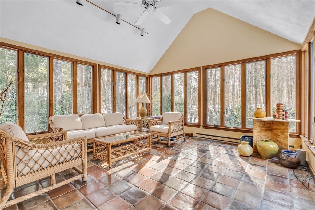 19 Sears Road Wayland, MA 01778 - Photo 10 of 42 a living room with furniture and large windows