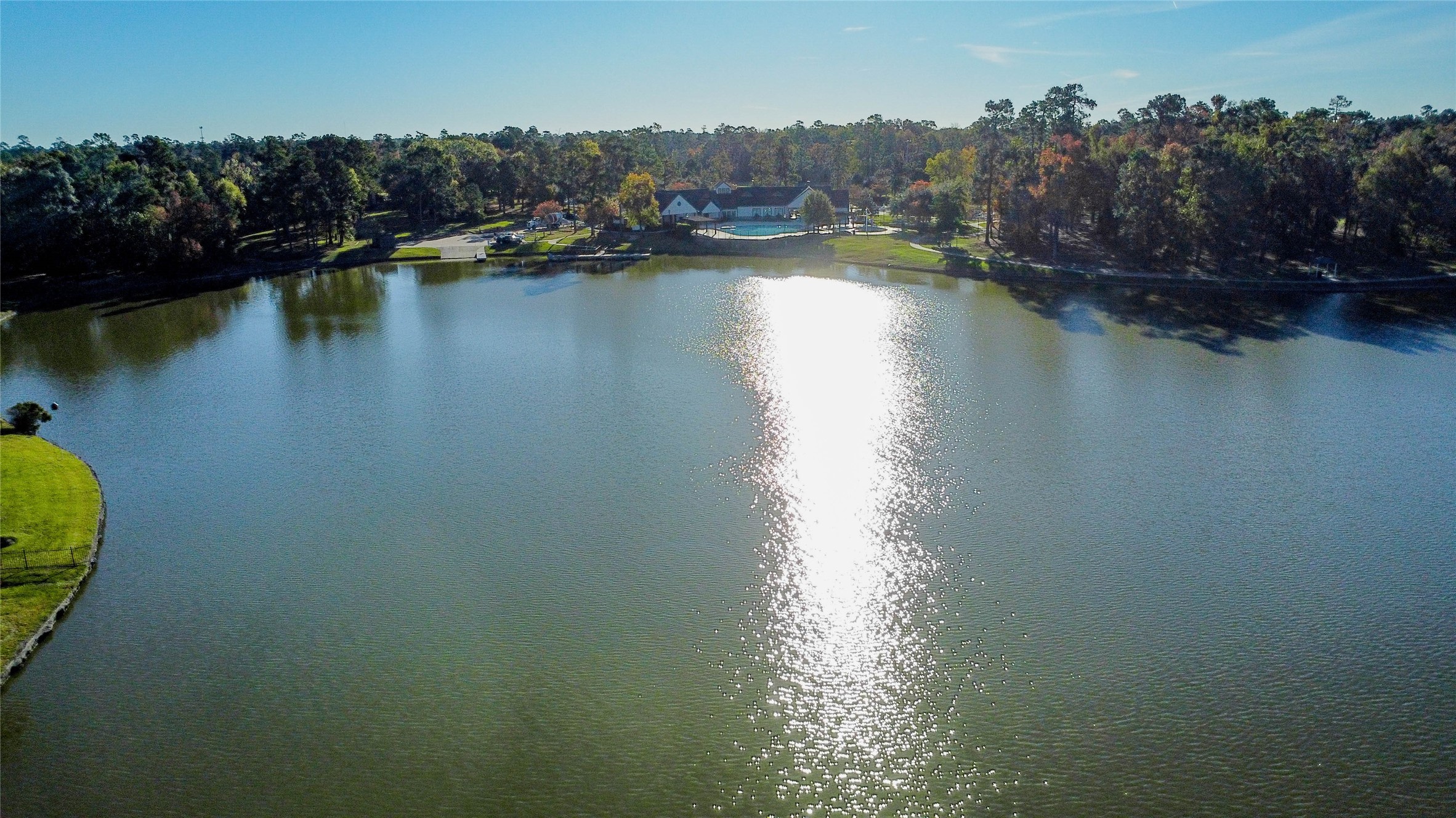 6302 Velvet Sky Court Spring, TX 77386 - Photo 11 of 16 an aerial view of residential houses with outdoor space and lake view
