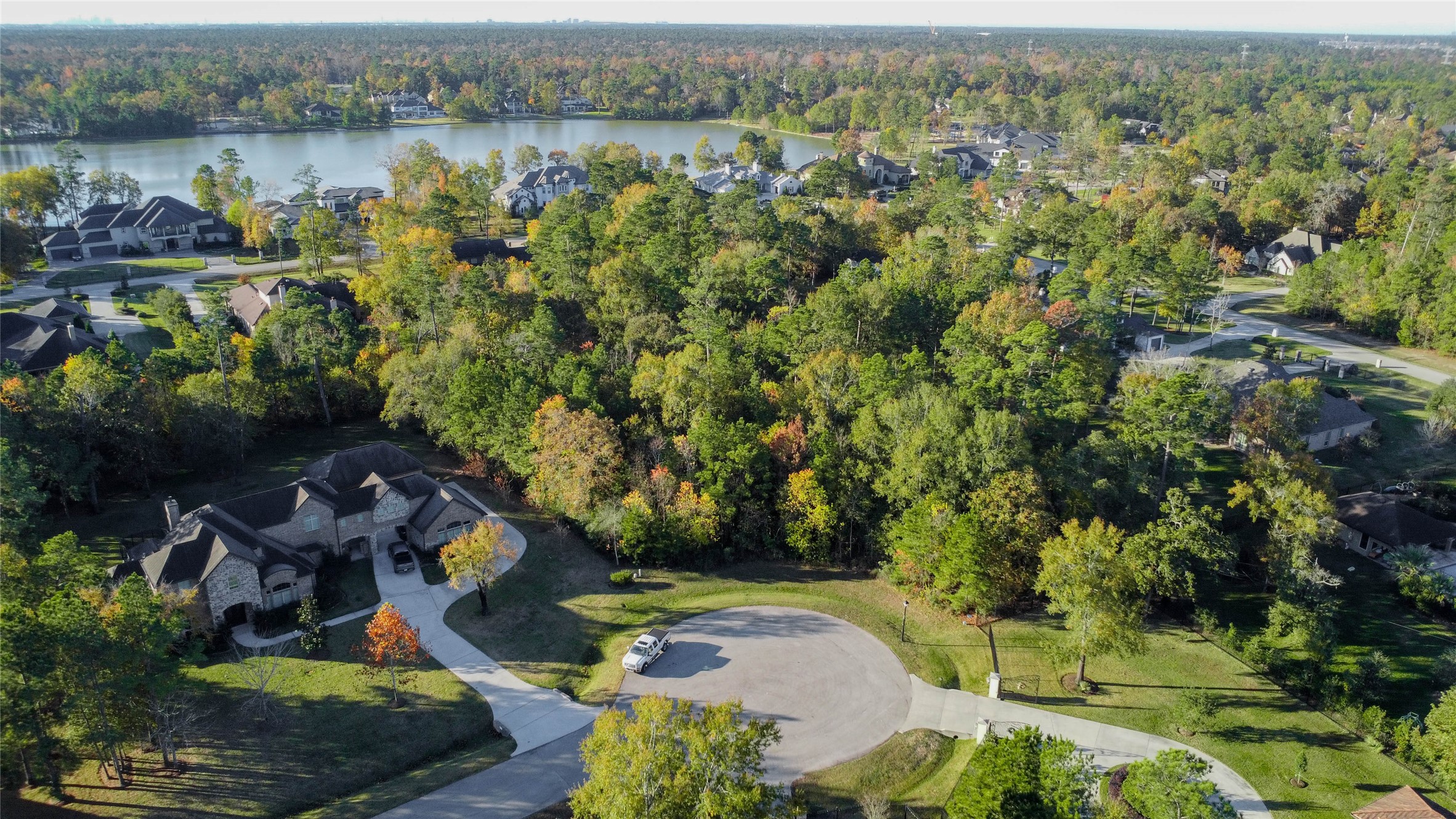 6302 Velvet Sky Court Spring, TX 77386 - Photo 3 of 16 an aerial view of a house with a yard and lake view