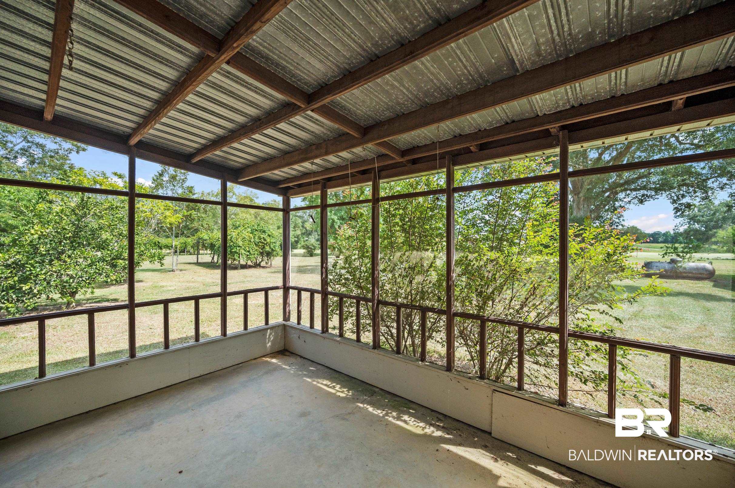 15600 Fackler Road Loxley, AL 36551 - Photo 24 of 51 View of unfurnished sunroom