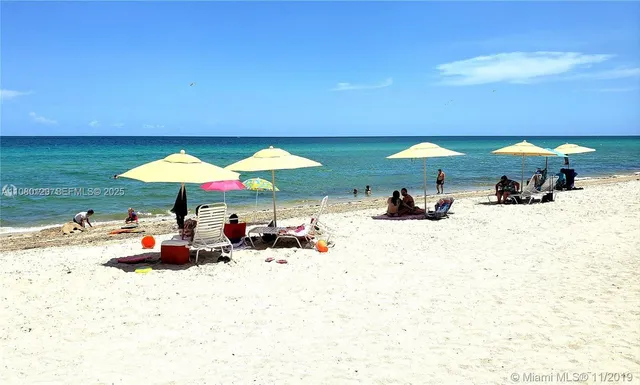 a view of a swimming pool and outside space