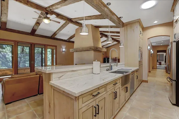 a view of a dining room with furniture window and outside view