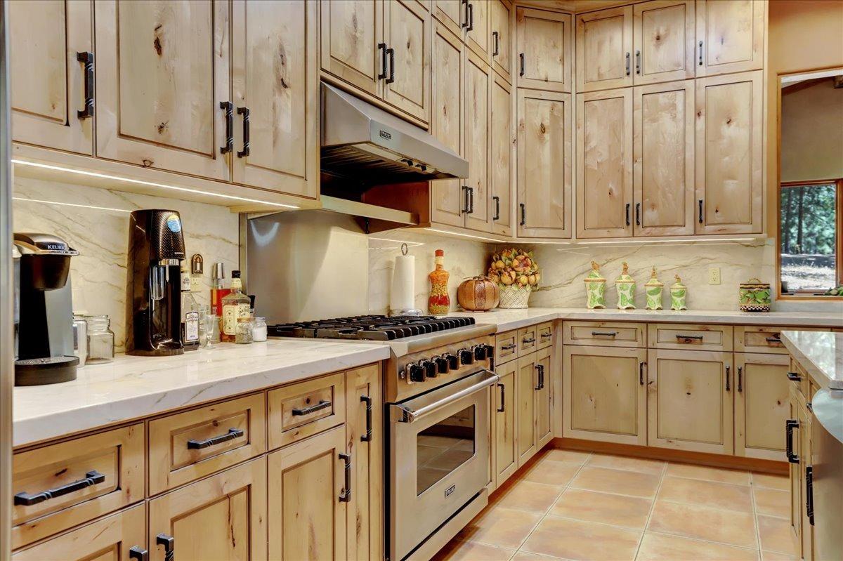 18955 Lake City Road Nevada City, CA 95959 - Photo 16 of 99 a kitchen with stainless steel appliances granite countertop a sink and cabinets