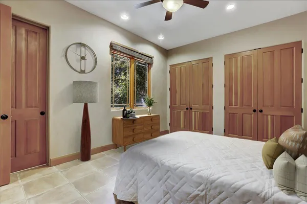 a kitchen with a refrigerator and a sink