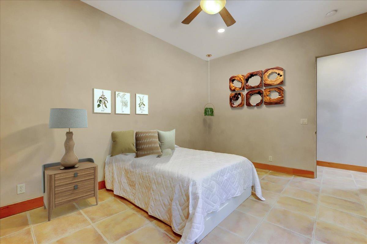 18955 Lake City Road Nevada City, CA 95959 - Photo 34 of 99 a bedroom with a bed and a painting on the wall