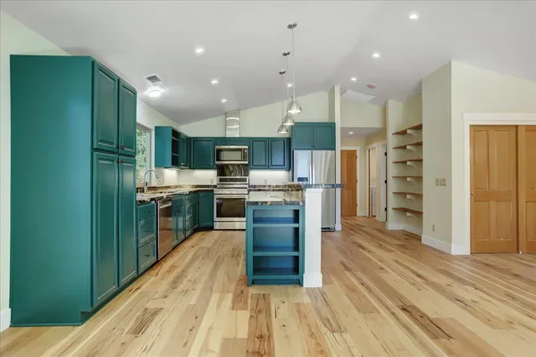 a view of outdoor space with trees all around