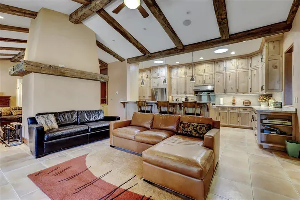 a kitchen with stainless steel appliances granite countertop a sink and cabinets