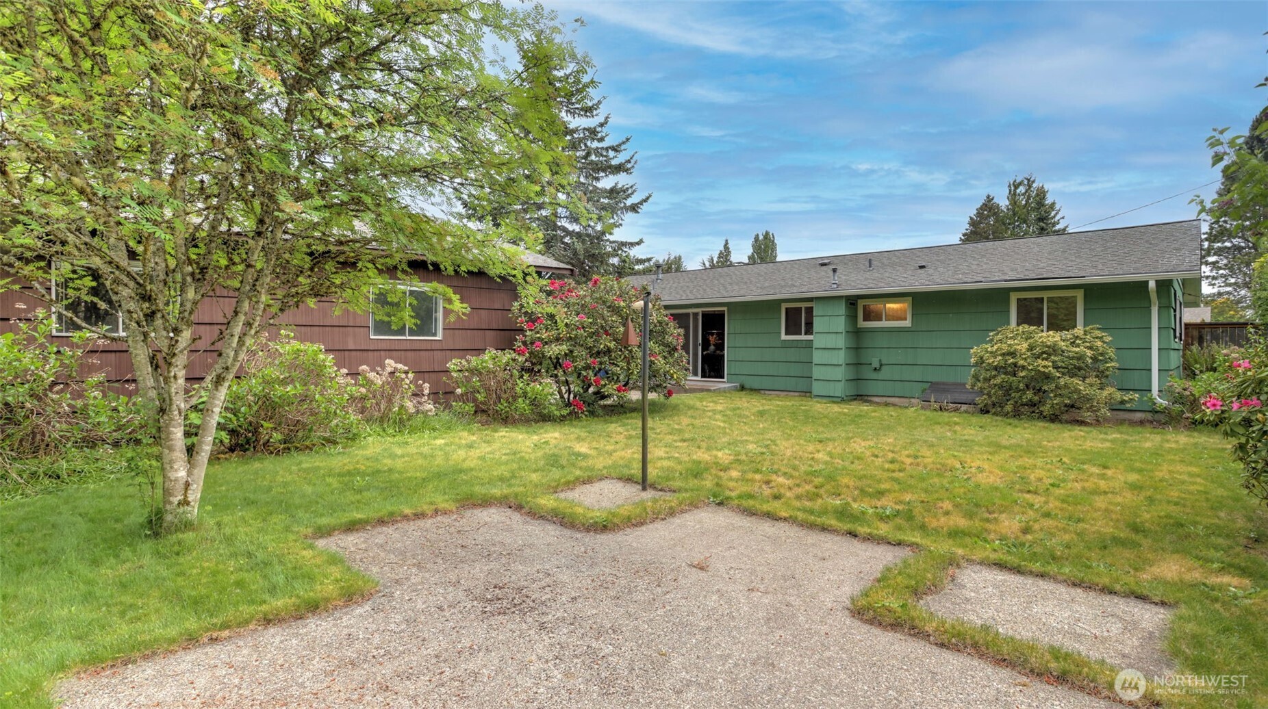 12515 Southeast 171st Street Renton, WA 98058 - Photo 20 of 24 front view of a house with a yard