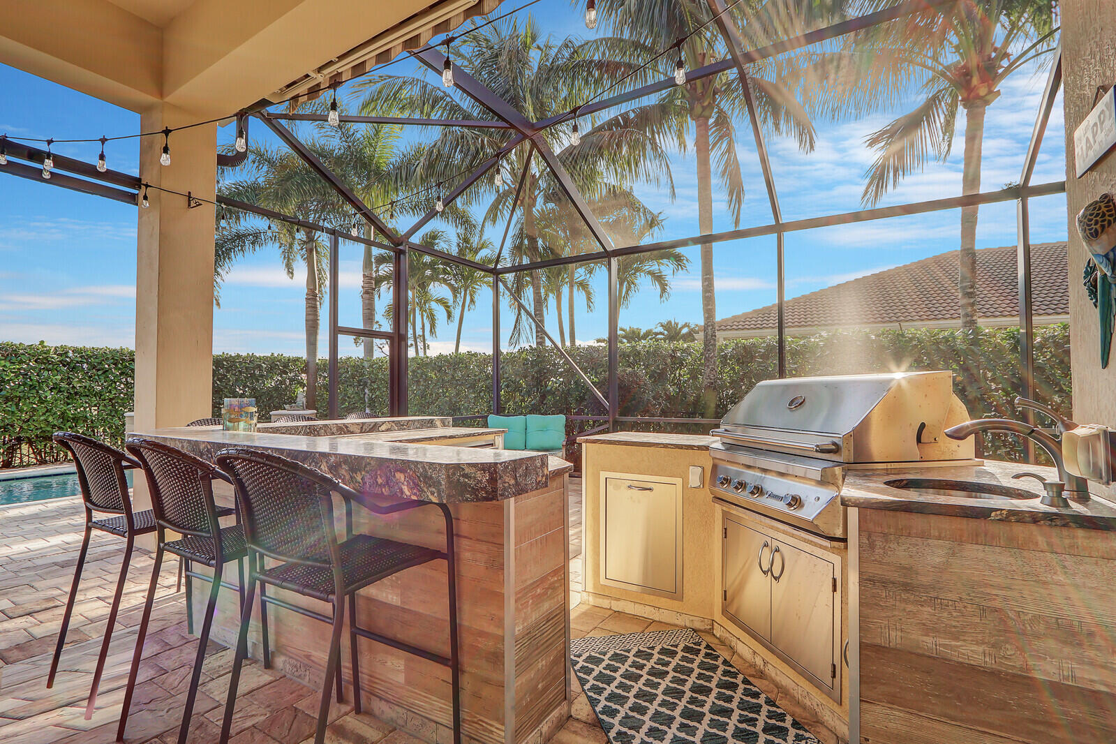 162 Sonata Drive Jupiter, FL 33478 - Photo 50 of 78 Screen-Enclosed Patio | Summer Kitchen