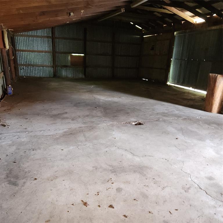 116 Cooper Street Pilot Point, TX 76258 - Photo 5 of 8 possible mancave?