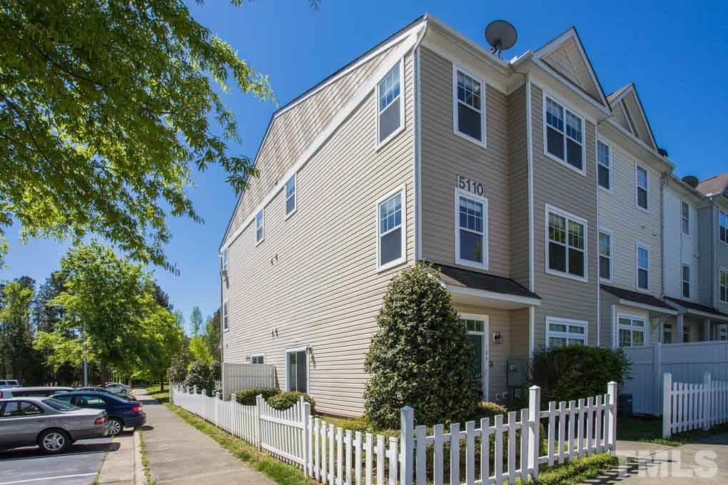 5110 Neuse Commons Lane, Unit 100 Raleigh, NC 27616 - Photo 2 of 27 a view of a street with houses