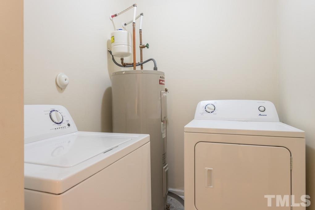 5110 Neuse Commons Lane, Unit 100 Raleigh, NC 27616 - Photo 16 of 27 a utility room with dryer and washer