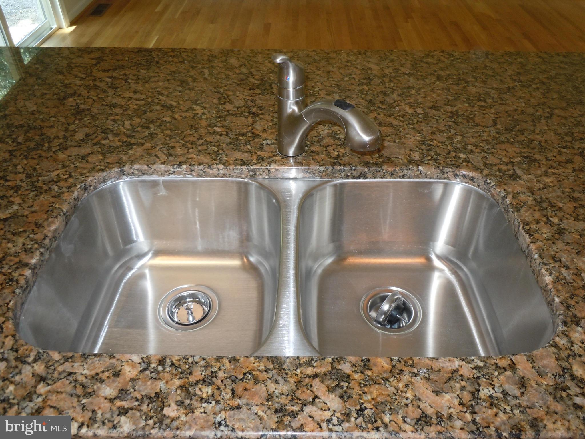7291 Token Valley Road Manassas, VA 20112 - Photo 12 of 26 Granite and Moen Faucet