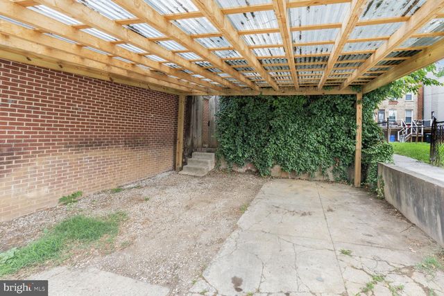 a view of a porch with plants