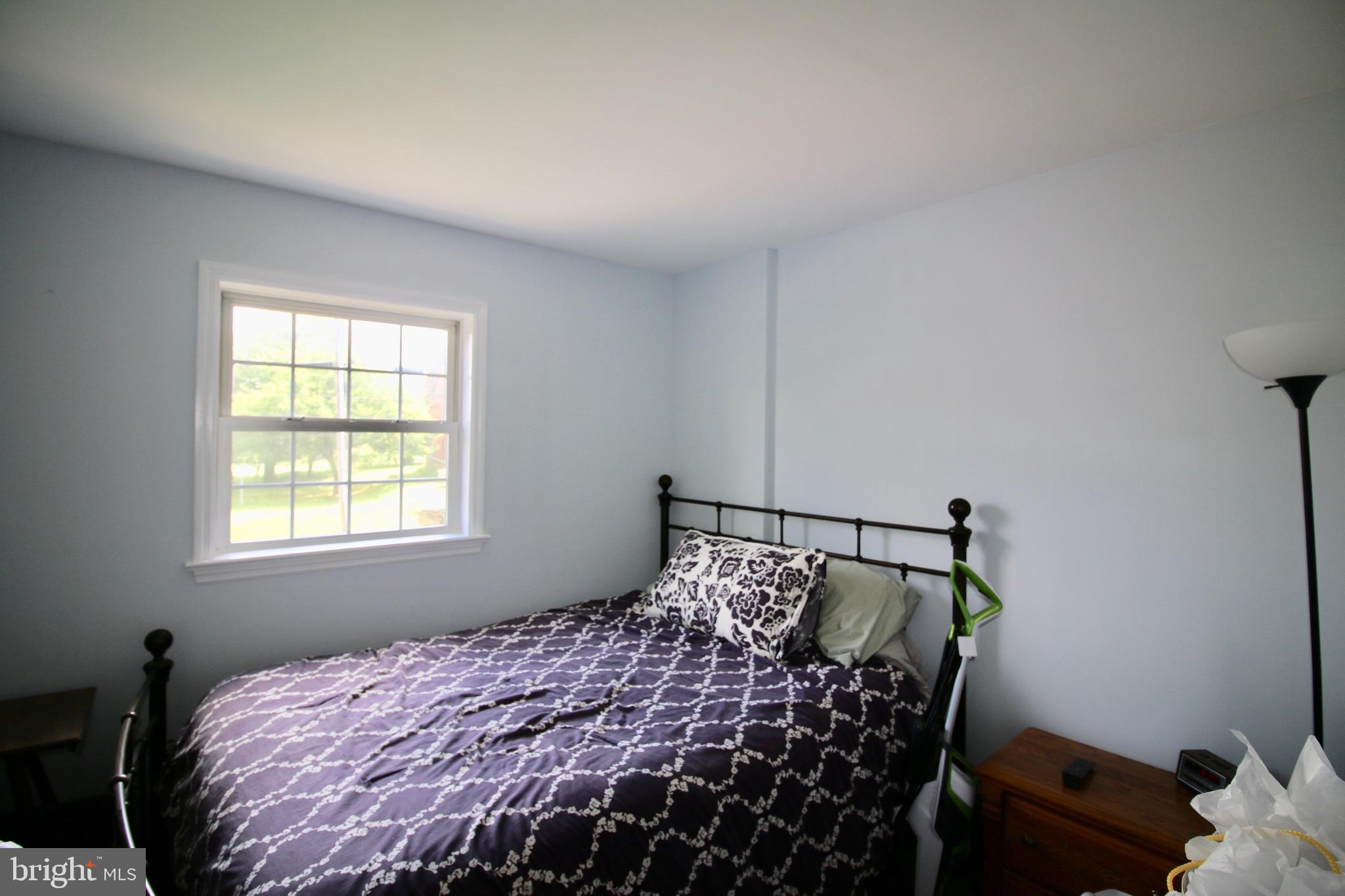 1314 Rawlinsville Road New Providence, PA 17560 - Photo 16 of 22 a bedroom with a bed and a window