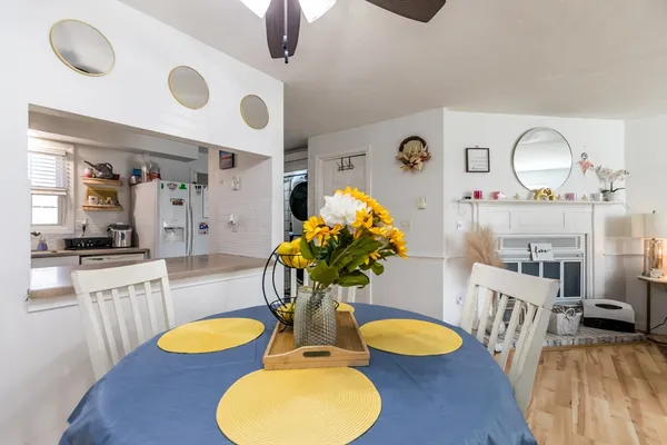 a kitchen with cabinets and window