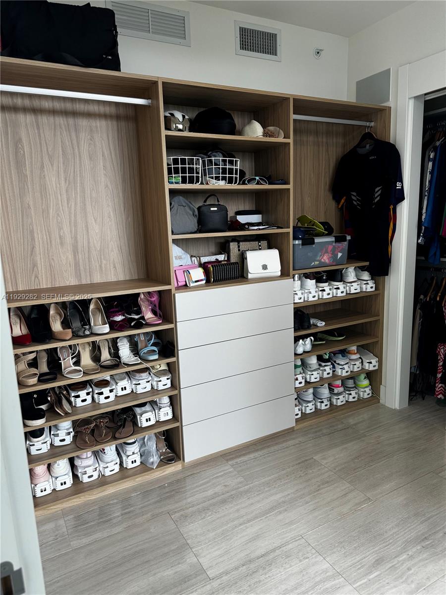 1451 Brickell Avenue, Unit 1105 Miami, FL 33131 - Photo 19 of 47 a view of storage and utility room