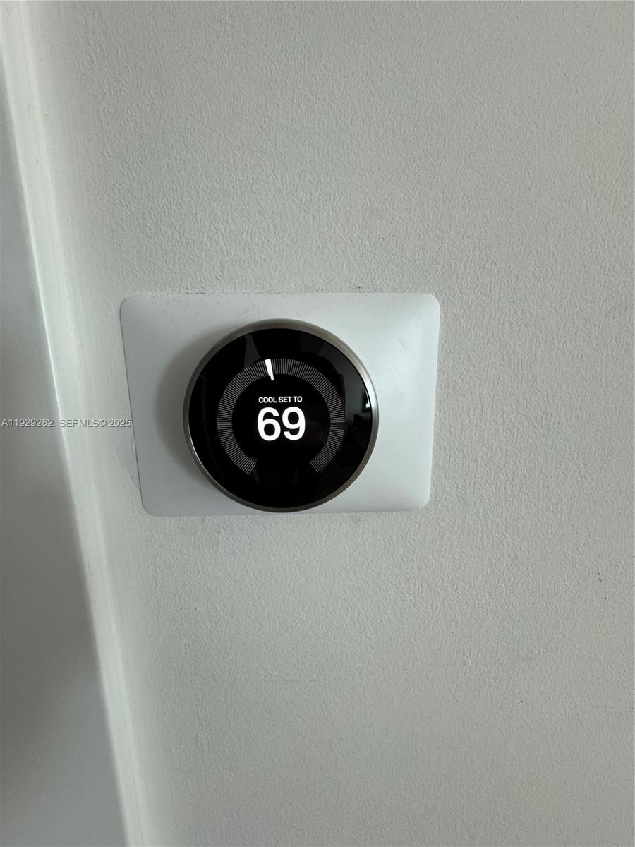 1451 Brickell Avenue, Unit 1105 Miami, FL 33131 - Photo 21 of 47 a close up of a white wall and a stove